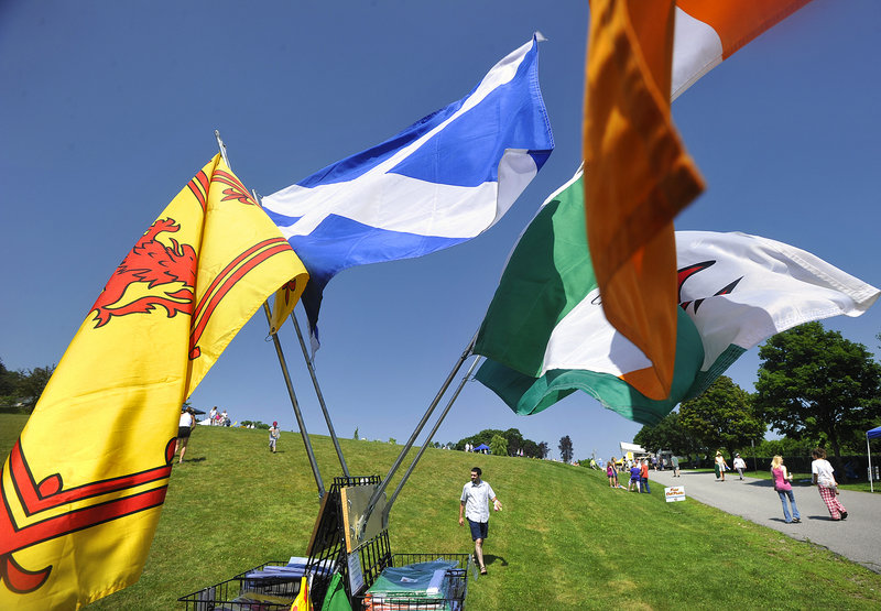 Flags billow in the breeze Saturday outside a tent selling Celtic ware.