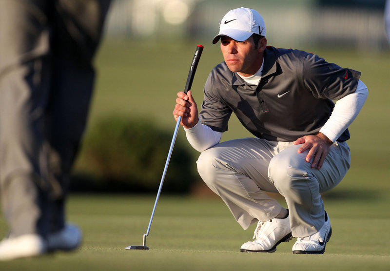 Paul Casey, lining up a putt on the 17th green Saturday during the third round of the British Open, is alone in second place and four shots behind Louis Oosthuizen, but remains hopeful of making a run in the final round today at St. Andrews.