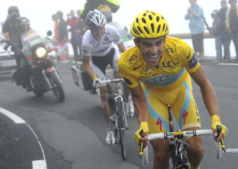 Alberto Contador tries to break away from Andy Schleck as they climb the Col du Tourmalet on Thursday in the Tour de France. Schleck won the stage but gained no time on his rival.
