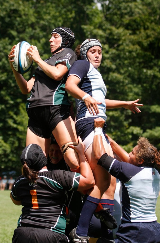 Farrah Douglas, far right at bottom, is part of the U.S. women's national rugby team spending a rare three weeks together at Bowdoin College, preparing for the World Cup next month in England.