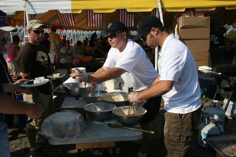 Volunteers fry the day's catch at last year's Veterans Appreciation Fishing Tournament in South Portland.