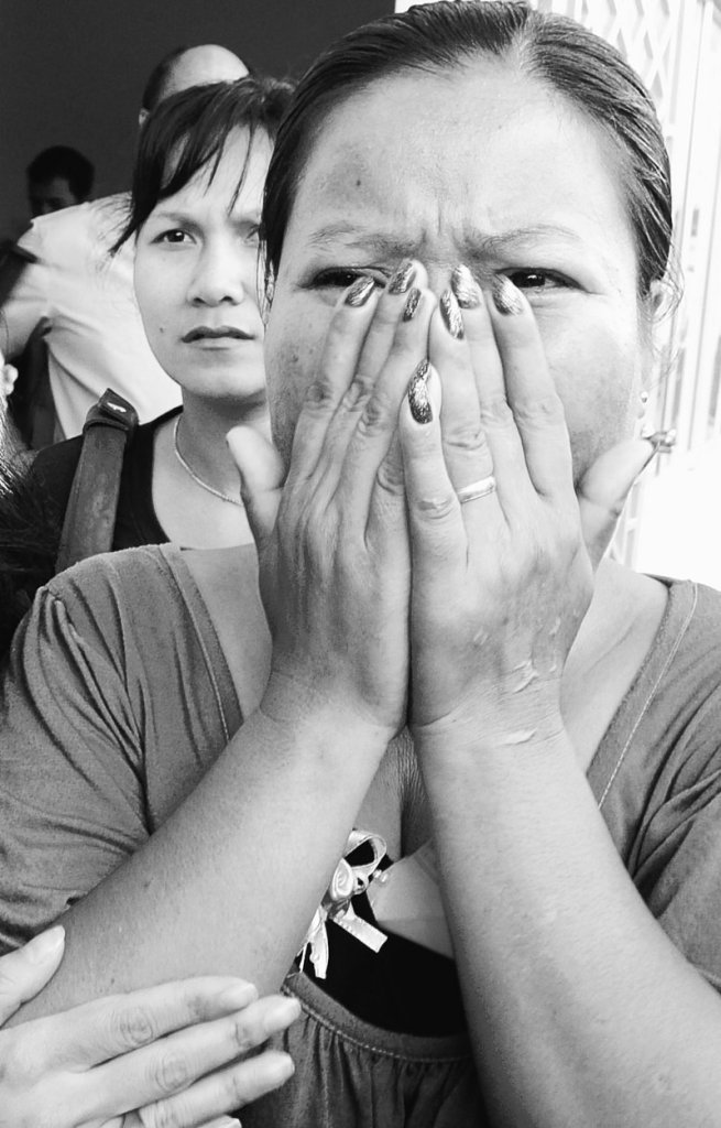 Cambodian victim Hong Savath, 47, weeps after the sentencing of Kaing Guek Eav, also known as Duch.