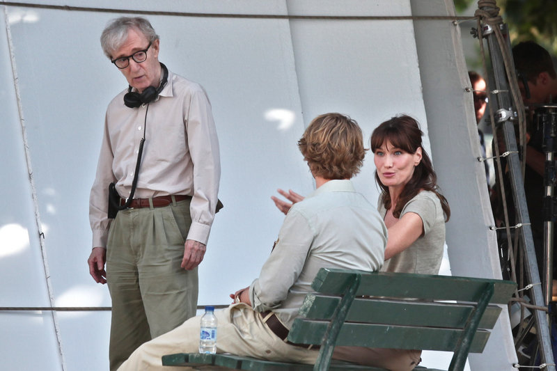 Carla Bruni-Sarkozy, the wife of French President Nicolas Sarkozy, is seen with director Woody Allen, left, and actor Owen Wilson in Paris on Wednesday.