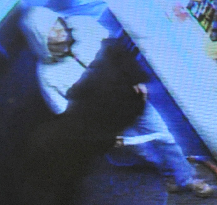 Surveillance photo of a man suspected of robbing the Scrub a Dub car wash Tuesday night