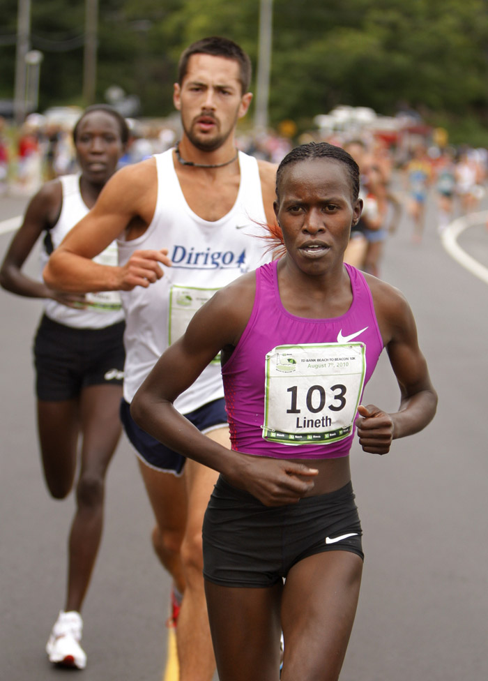 Lineth Chepkurui set a new women's course record with a time of 30 minutes, 59.4 seconds in the TD Bank Beach to Beacon 10K road race today.