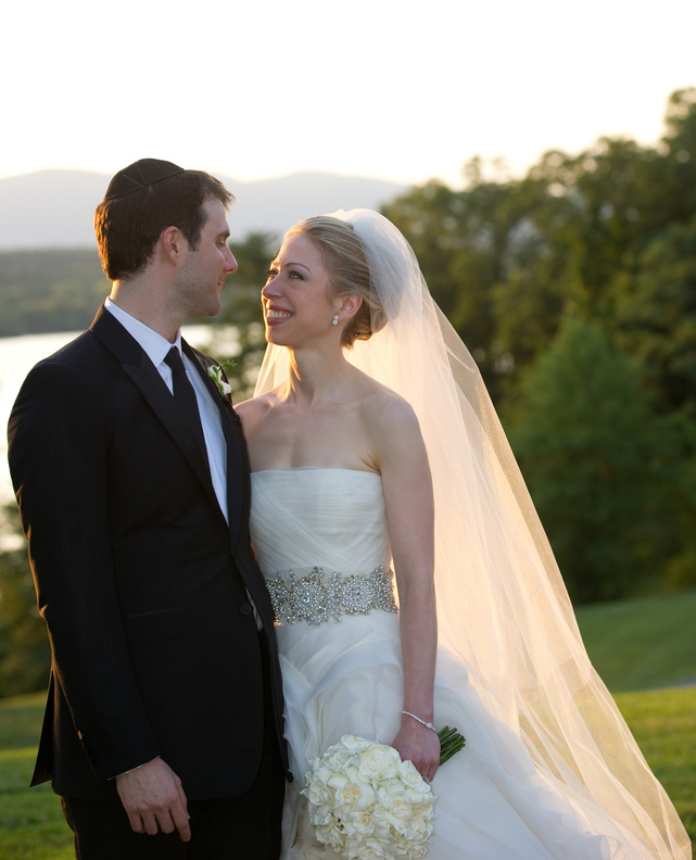 Chelsea Clinton and Marc Mezvinsky are seen during their wedding Saturday at an elegant Hudson River estate called Astor Courts in Rhinebeck, N.Y.