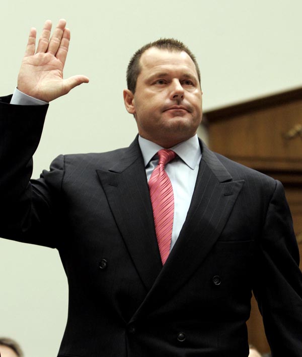 Former New York Yankees pitcher Roger Clemens is sworn in on Capitol Hill on Feb. 13, 2008, prior to testifying before the House Oversight and Government Reform committee hearing on drug use in baseball. HGH oath performance-enhancing drugs professional baseball playe