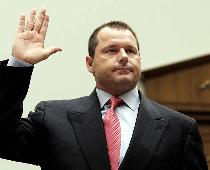 Former New York Yankees pitcher Roger Clemens is sworn in on Feb. 13, 2008, prior to testifying before a House committee hearing on drug use in baseball. HGH oath performance-enhancing drugs professional baseball playe