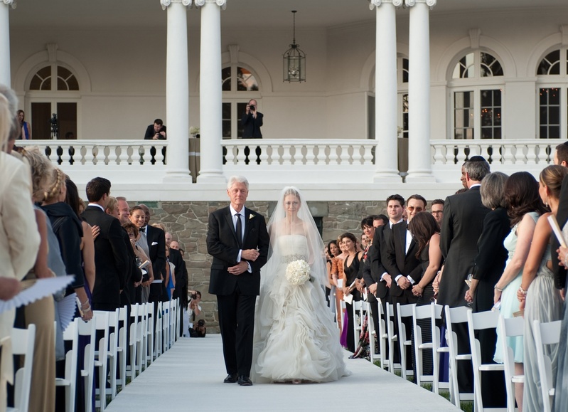 Former President Bill Clinton walks his daughter, Chelsea, down the aisle for her wedding Saturday in Rhinebeck, N.Y. Chelsea Clinton wed her longtime boyfriend, investment banker Marc Mezvinsky, after weeks of secrecy that had celebrity watchers flocking to the village.