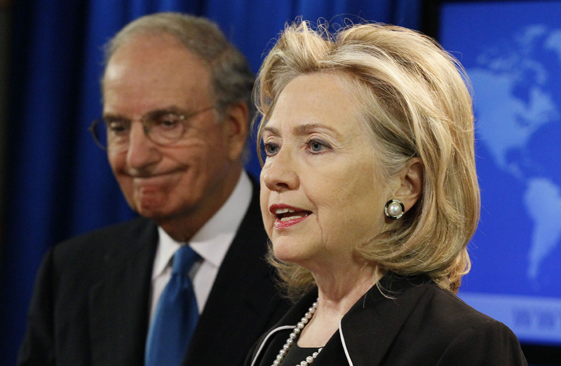Secretary of State Hillary Rodham Clinton, right, accompanied by special Mideast peace envoy George Mitchell, talks with the media about Mideast peace talks today.