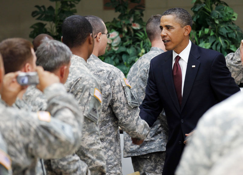 President Barack Obama greets members of the military at Fort Bliss in El Paso, Texas, today. Tonight, the president is to deliver a 15-20 minute speech in prime time from the Oval Office. His point is to mark Aug. 31, 2010, as the final day the U.S. led the war in Iraq after more than seven years.