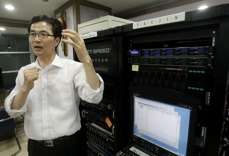 Cho Byung-cheol, president of Taejin Infotech Co., explains the use of a semiconductor-based high-speed data storage system at his office in Seoul, South Korea.