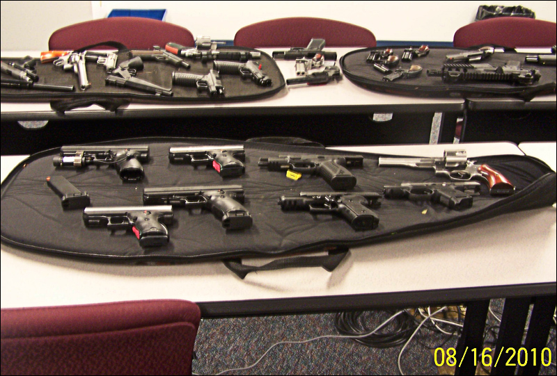 Guns recovered from a burglary on Saturday are displayed at the Winthrop Police Department on Tuesday. Police said they recovered all 34 guns stolen as well as the ammunition from the rooftop break-in at Audette's Hardware store in Winthrop.