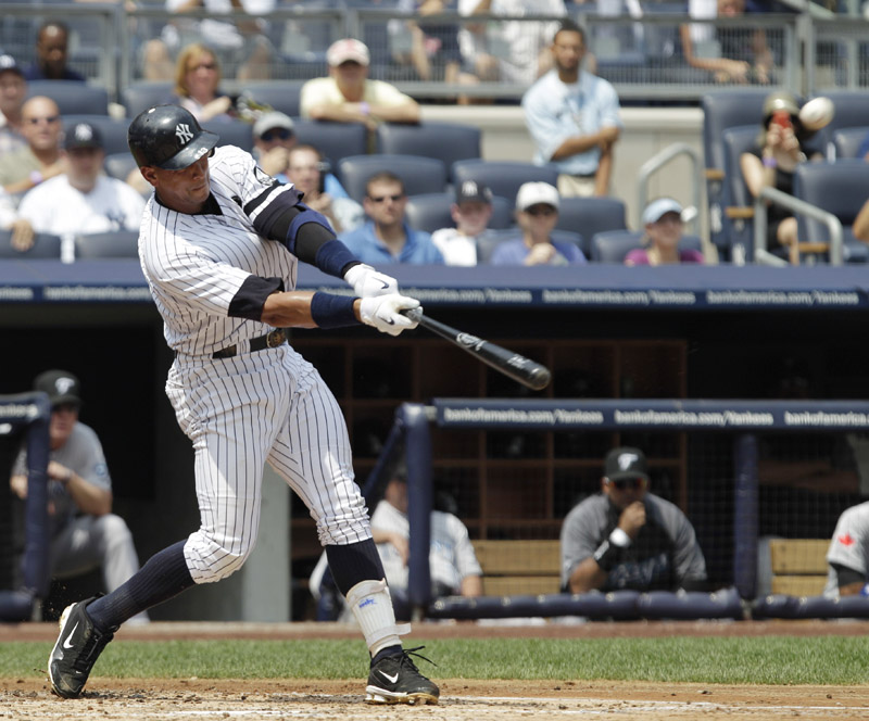 New York Yankees' Alex Rodriguez connects for his 600th career home run during the first inning of a game against the Toronto Blue Jays at Yankee Stadium today.