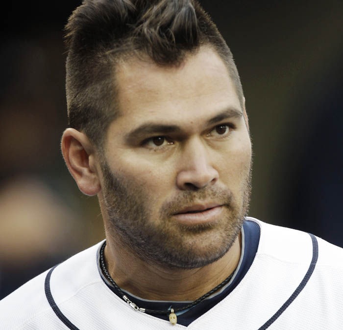 Detroit Tigers' Johnny Damon watches from the dugout in the first inning of a baseball game against the Kansas City Royals in Detroit recently. The 36-year-old outfielder decided not to accept a trade to the Red Sox, who claimed him off waivers.