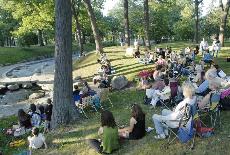 Audience members for “Twelfth Night” sit on their own chairs and blankets under the trees of Deering Oaks. It’s a casual atmosphere for a high-quality performance.