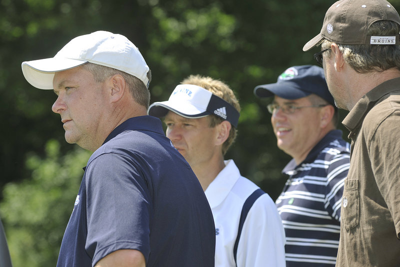 Mike Golden, left, a member of the first Maine team to reach the Frozen Four in 1988, was one of about 20 former Black Bears who participated in Monday's event.