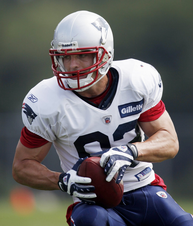 Wes Welker makes a cut during a drill Monday at the Patriots camp. The Patriots are preparing for their preseason opener next Thursday against the New Orleans Saints.