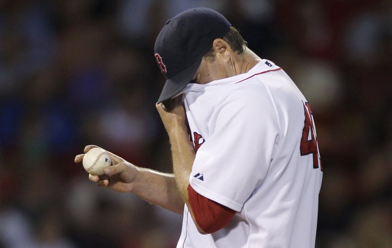 It looks as if Boston’s John Lackey is trying to hide, and who could blame him. In 51⁄3 innings Monday, he gave up six runs and nine hits and walked five.