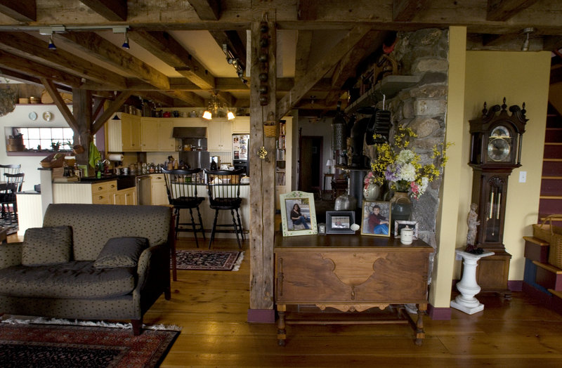 Old beams grace an open yet cozy living area.