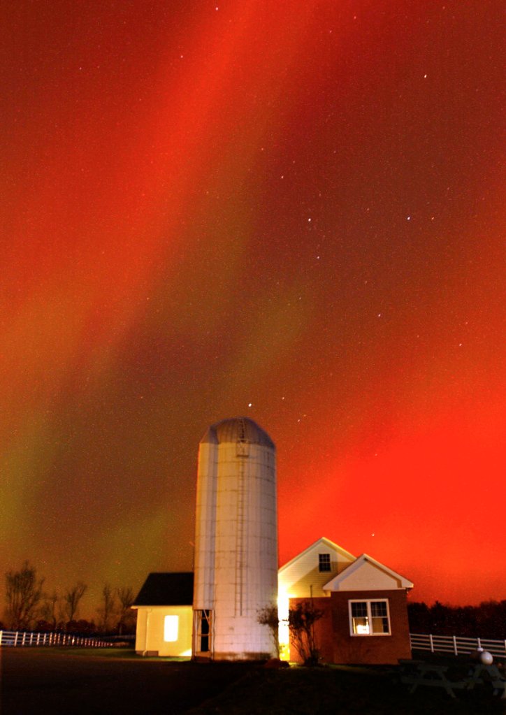 The northern lights flutter over Pineland Farms in New Gloucester in this 30-second exposure photograph from October 2003. A similar light show could occur tonight.