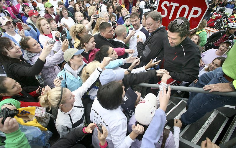 Maine native and actor Patrick Dempsey greets the crowd before the start of the Dempsey Challenge in Lewiston last October. The event is a fundraiser for the Patrick Dempsey Center for Cancer Hope & Healing.