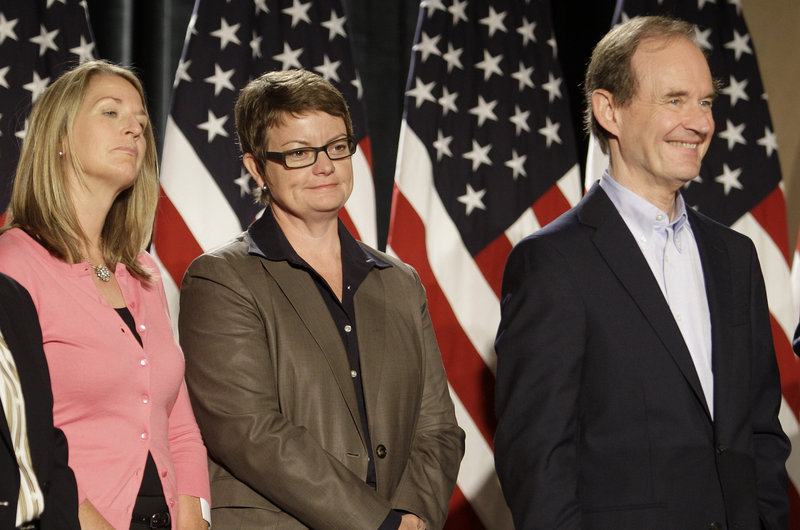 Sandy Stier, left, and Kris Perry attend a news conference with attorney David Boies in San Francisco on Wednesday. Stier and Perry were plaintiffs in a federal court case challenging Proposition 8, California's ban on same-sex marriages.