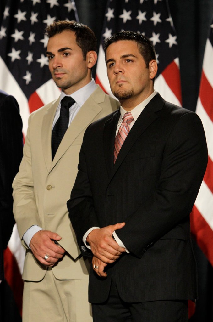 Paul Katami, left, and Jeff Zarrillo, plaintiffs in the lawsuit, attend the news conference.