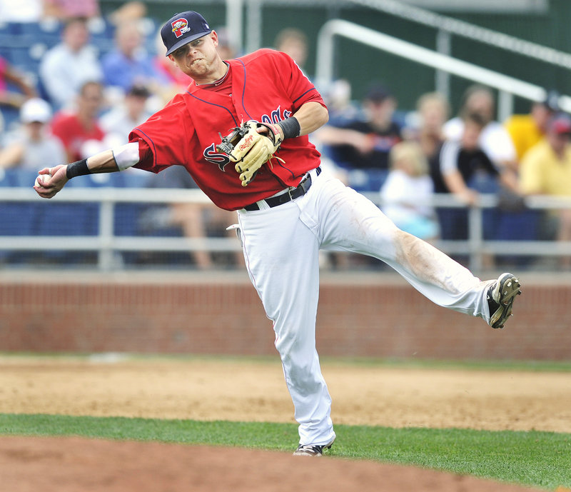 Ryan Khoury, the Sea Dogs' third baseman, makes an off-balance throw after fielding a slow grounder behind the mound during a 4-3 loss against Bowie on Thursday at Hadlock Field.