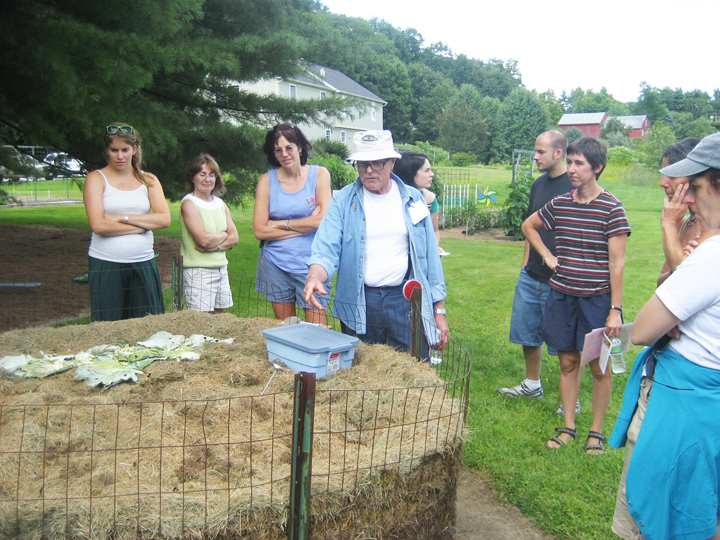 Norm Steele, at left, talks about composting during last year’s Backyard Locavore Tour. His garden is once again on the tour.
