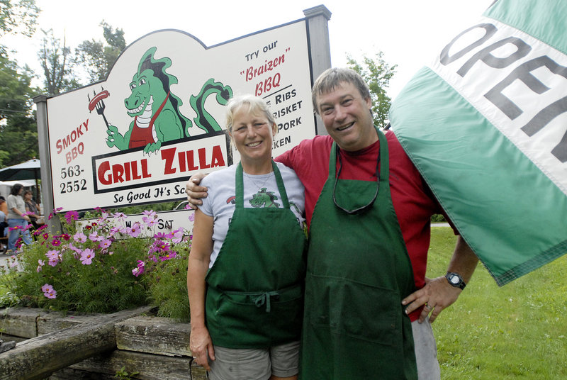 Sarah Burnham and Jay Swett, owners of Grill Zilla BBQ in Damariscotta, are accused of trademark infringement by Godzilla's lawyers.