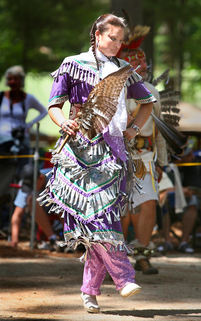 Stacy Jenness of Farmington, N.H., joins in an intertribal dance.