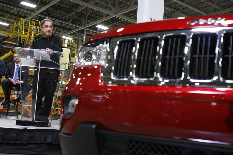 Chrysler CEO Sergio Marchionne introduces the 2011 Jeep Grand Cherokee, which came out in June and was the first new vehicle released after Fiat took over.