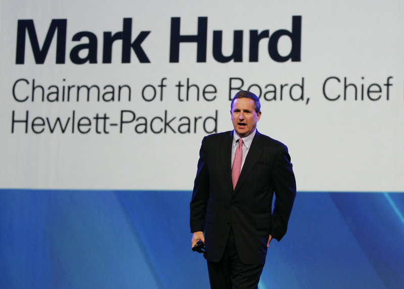 Mark Hurd, then Hewlett-Packard’s CEO, walks on stage during the 2007 Oracle Open World conference in San Francisco. His severance for a forced resignation could top $40 million.