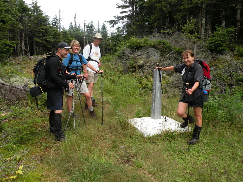 Three hikers in Quebec and one in the United States.