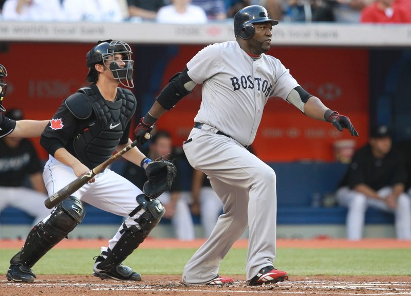 David Ortiz hits a double during the second inning Tuesday night against the Blue Jays in Toronto. The Red Sox won 7-5, collecting their eighth victory in their last 11 games on the road.