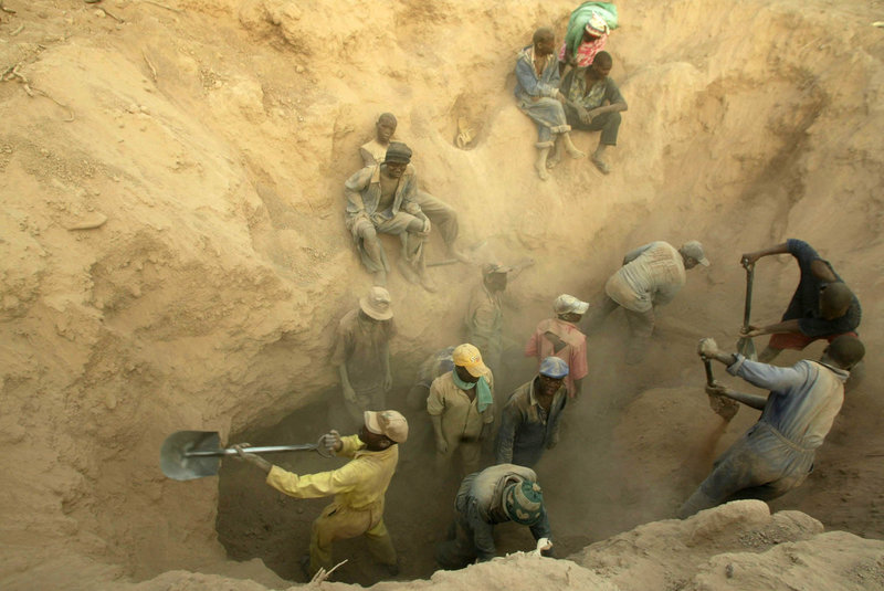 Miners dig for diamonds in Marange, Zimbabwe, in 2006, in a mine that became notorious for human rights abuses.