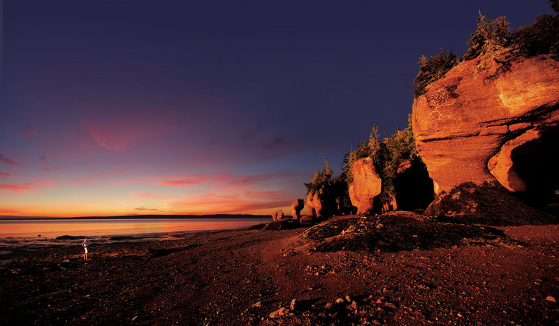 Enormous flowerpot-shaped formations at Hopewell Rocks along the Bay of Fundy in New Brunswick can be explored on foot at low tide and by kayak at high tide.