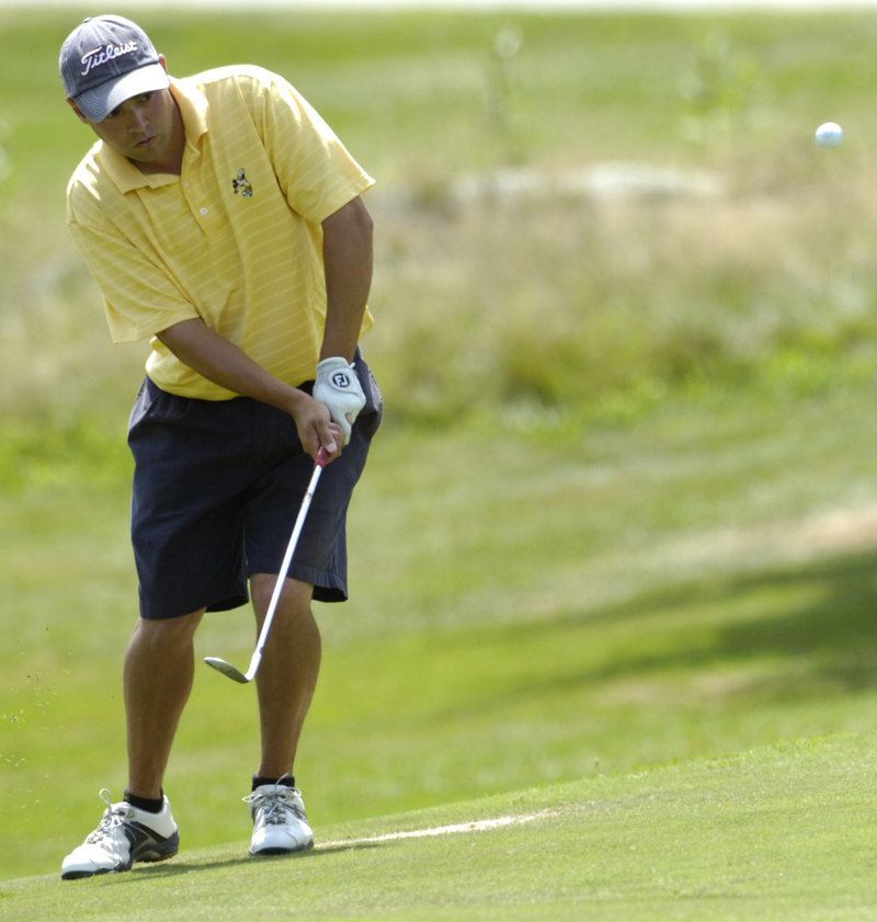 Joe Alvarez chips during his match against Mark Plummer on Thursday in the MSGA match play championship. Alvarez won the title by beating Plummer, 3 and 2.