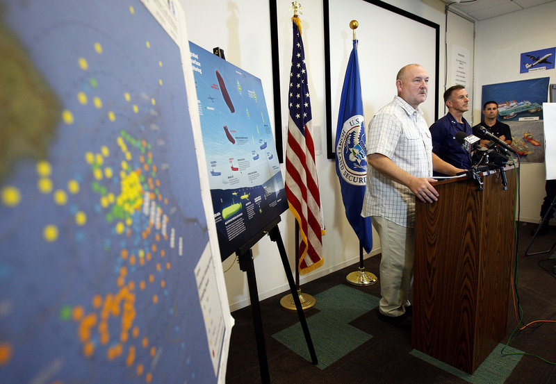 “The relief well will be finished,” retired Coast Guard Adm. Thad Allen, left, told reporters Friday in Schriever, La. In the foreground is a subsurface monitoring map of the Gulf.