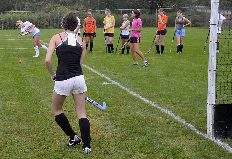 Biddeford field hockey players execute a drill as they begin preparations for their season opener Sept. 2 at Kennebunk.
