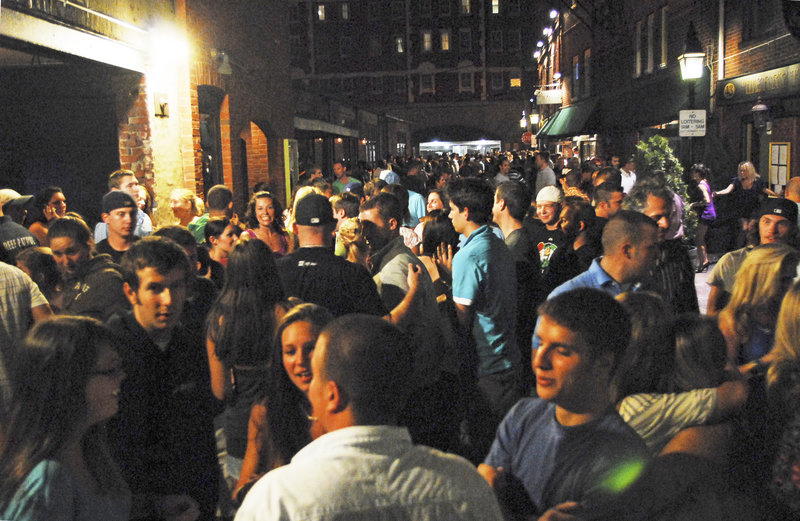 Though the night of Friday, Aug. 13, was uncommonly quiet in Portland's Old Port, closing time still resulted in a flood of young people on Wharf Street. This was the scene at about 1:15 a.m., a half-hour after last call.
