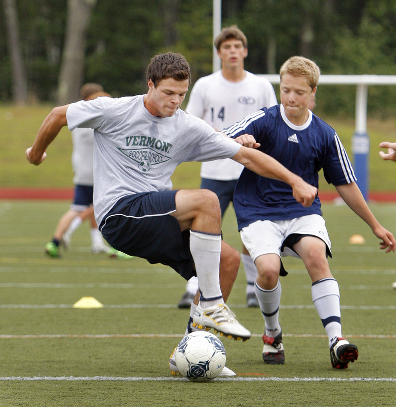 Luke Pierce shields the ball from one of his Yarmouth boys' soccer teammates. Pierce, a senior, is a three-sport athlete and was the Clippers' leading scorer last fall.