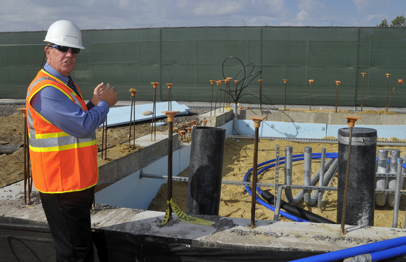 Roy Williams, jetport deputy director, explains how the geothermal system works. Fluid circulating in tubes will absorb the earth’s heat in the winter and dump heat in the summer.