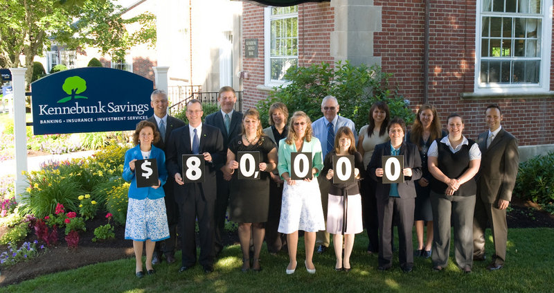 Kennebunk Savings employees celebrate the donation of $80,000 as part of the bank’s annual Customer Ballot.