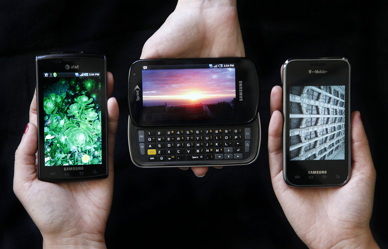 The Samsung Captivate, left, Samsung Epic 4G, center, and the Samsung Vibrant phones have some good features in common.