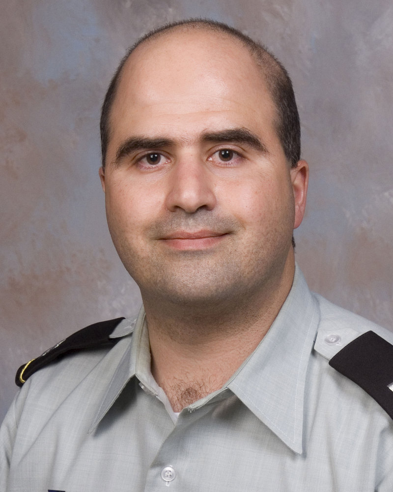 Maj. Nidal Hasan allegedly killed 13 people on an Army post in Texas on Nov. 5. A subsequent Pentagon report urges better awareness of potential internal threats.