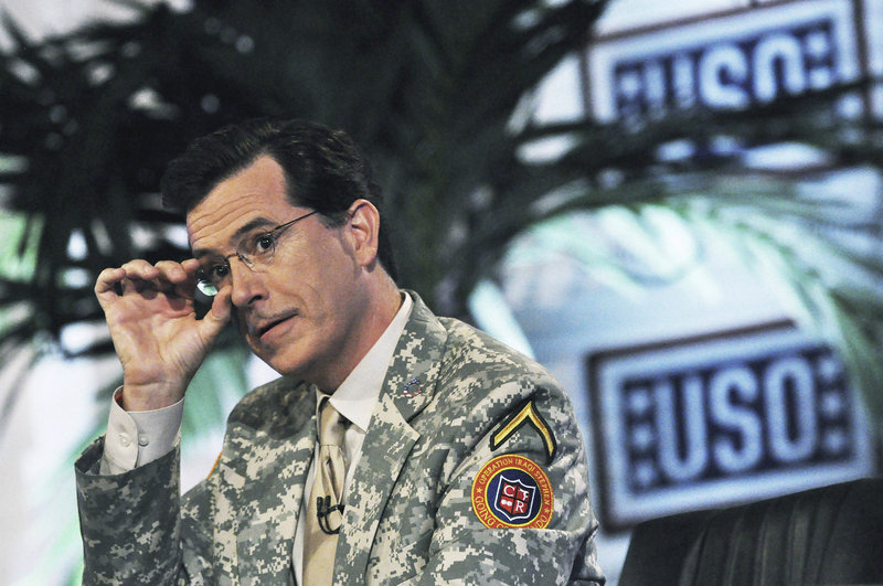 Stephen Colbert of the Comedy Central television program “The Colbert Report” tapes the first of four shows in front of U.S. soldiers at Camp Victory in Baghdad, Iraq.