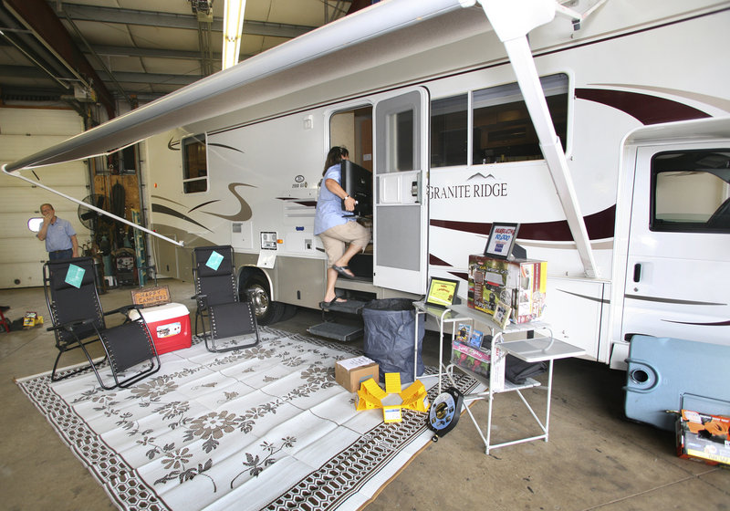 The Joneses viewed the inside of the new, fully furnished motor home they won Tuesday.