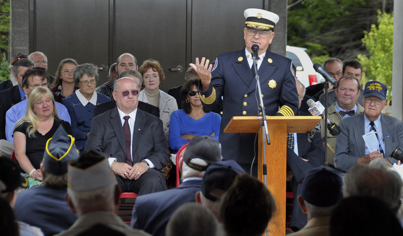 Sanford Fire Chief Raymond Parent addresses a crowd of about 500 at the dedication of the Southern Maine Memorial Veterans Cemetery in Sanford on Tuesday. He said the first military funeral there will be for former state Rep. Roger Landry.